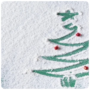 christmas tree on snow ground